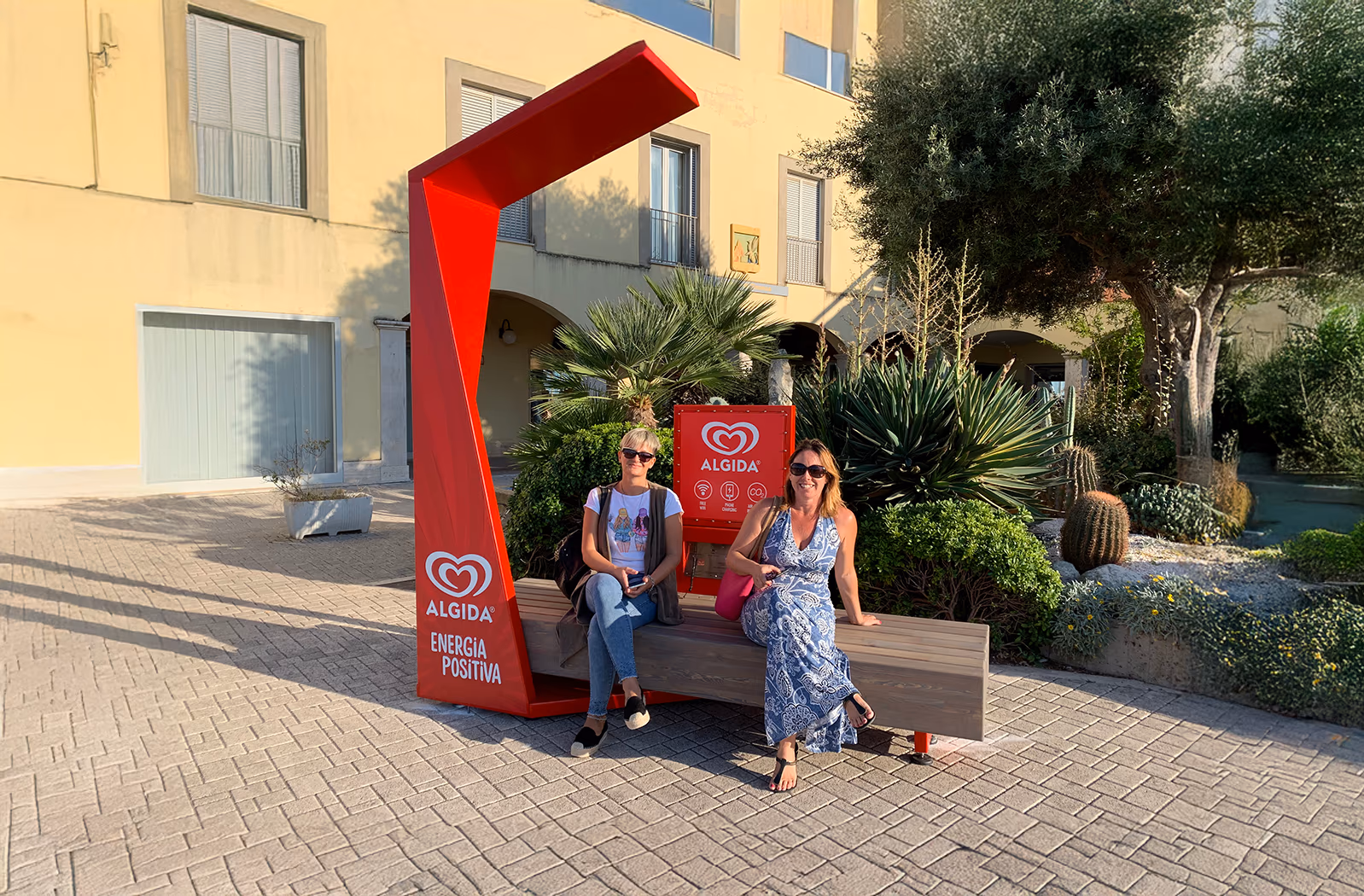 SSB Smart Shelter bench with Algida brand in a public plaza