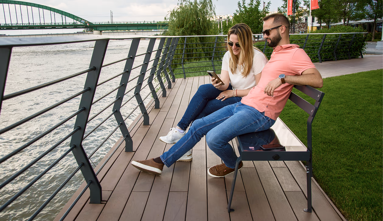 Couple using SunSeat bench